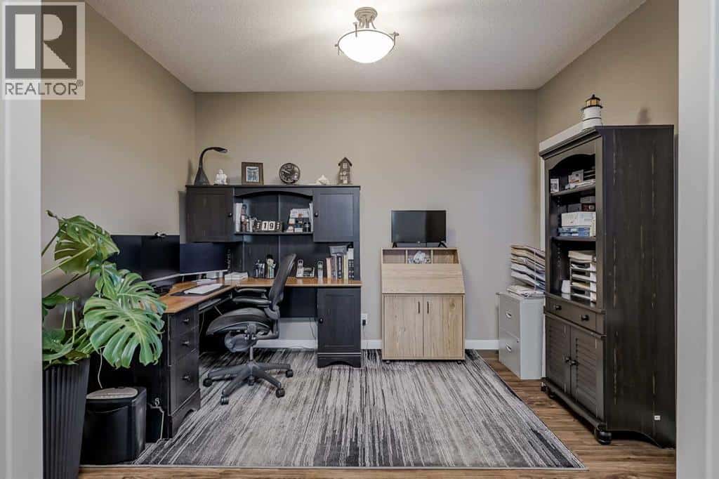 60 Sheep River Heights — Okotoks, Alberta - Photo 5 of 50