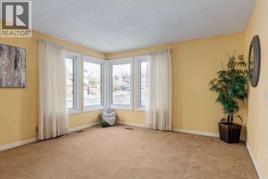 3 Hawkcliff Way NW — Calgary, Alberta - Photo 3 of 46