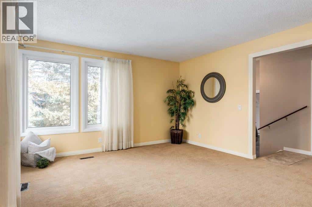 3 Hawkcliff Way NW — Calgary, Alberta - Photo 4 of 46