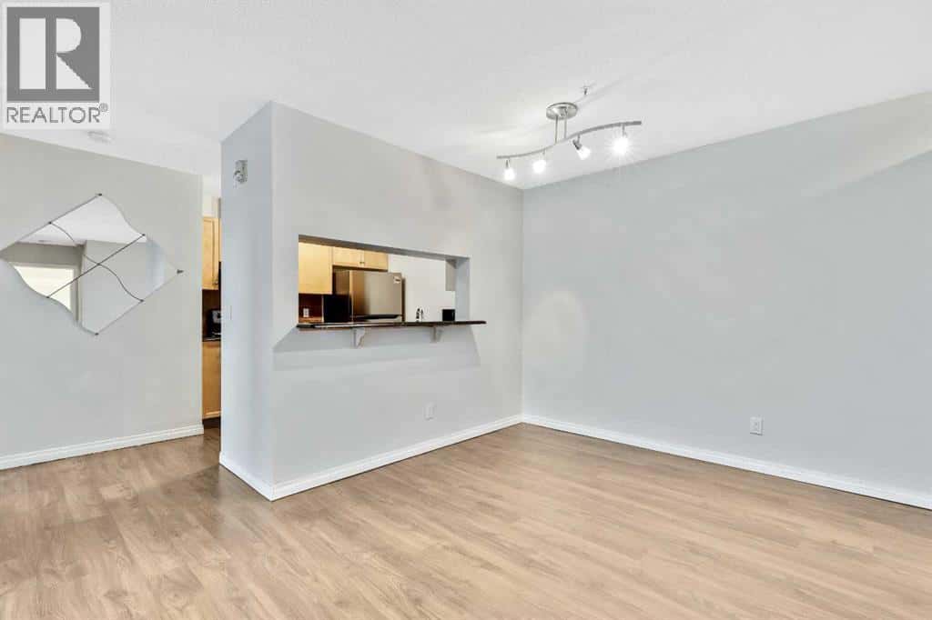 118, 2022 Canyon Meadows Drive SE — Calgary, Alberta - Photo 4 of 25