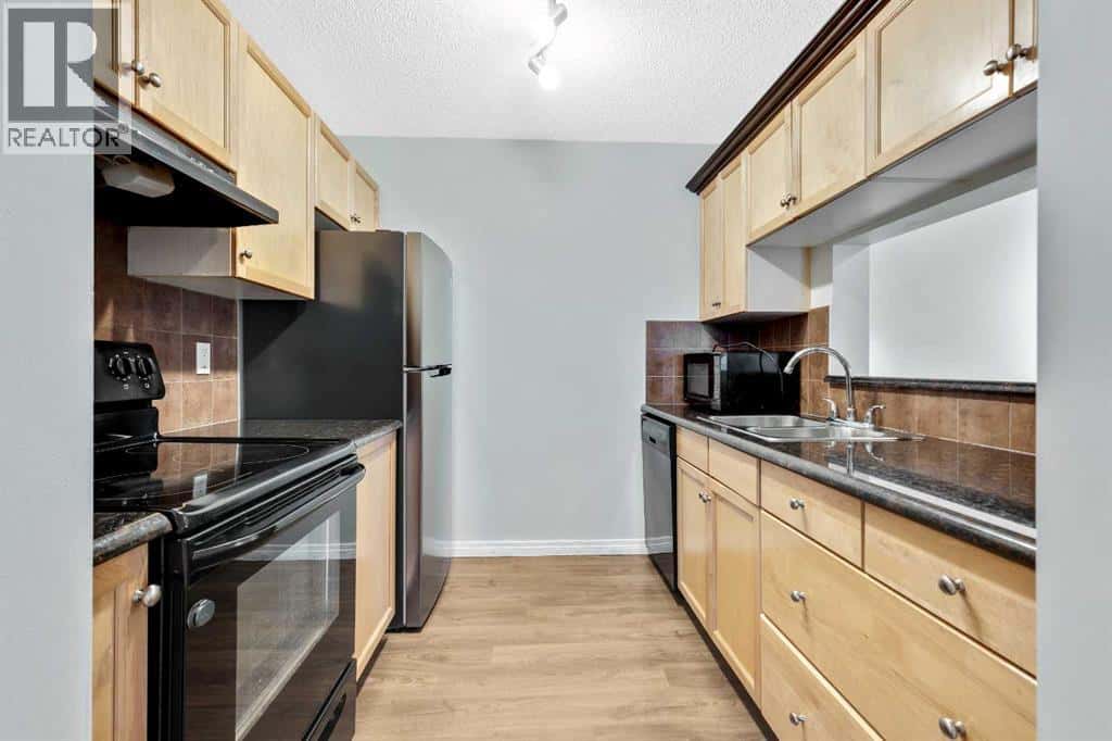 118, 2022 Canyon Meadows Drive SE — Calgary, Alberta - Photo 5 of 25