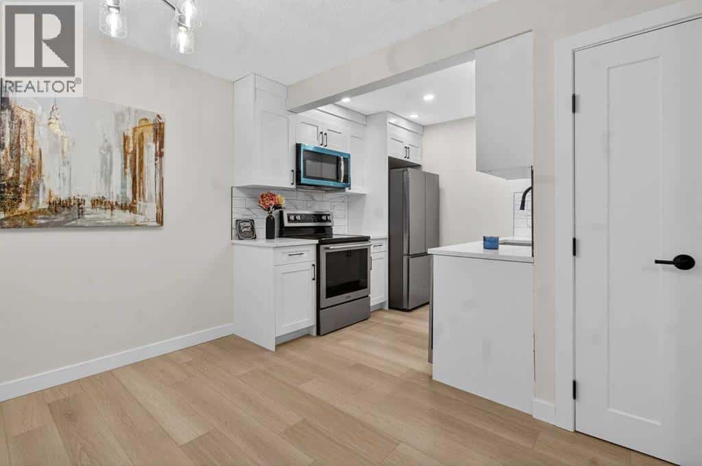 25, 6100 4 Avenue NE — Calgary, Alberta - Photo 4 of 31