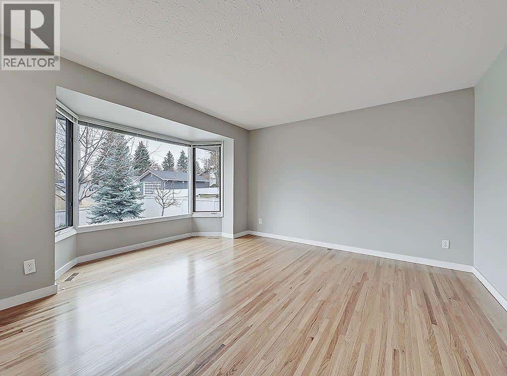 56 Glenpatrick Drive SW — Calgary, Alberta - Photo 3 of 23