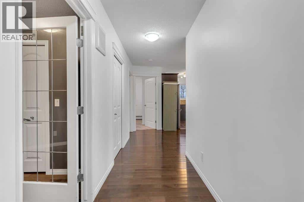 1202, 175 Panatella Hill NW — Calgary, Alberta - Photo 3 of 21