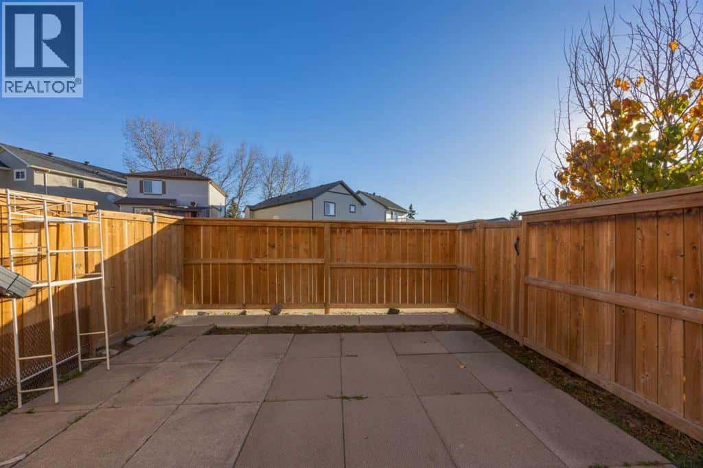 1616, 7451 Falconridge Boulevard NE — Calgary, Alberta - Photo 5 of 37