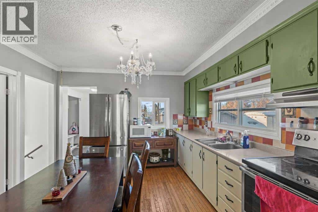 9321 105 Avenue — Grande Prairie, Alberta - Photo 3 of 17