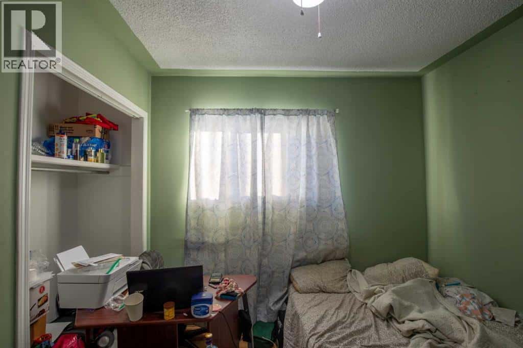 9321 105 Avenue — Grande Prairie, Alberta - Photo 5 of 17