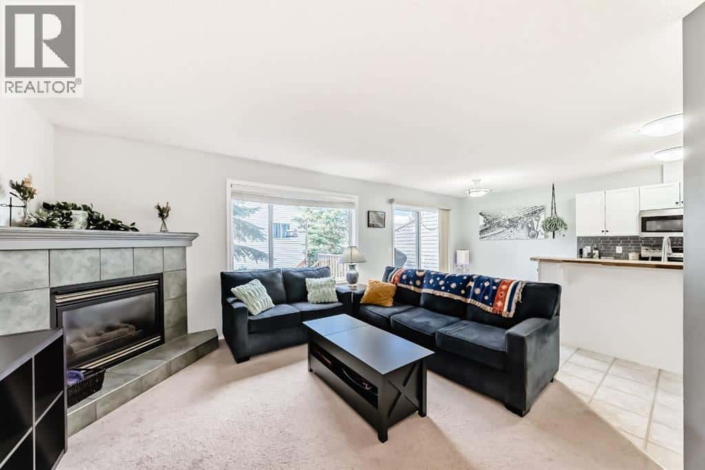 8, 122 Bow Ridge Crescent — Cochrane, Alberta - Photo 3 of 36