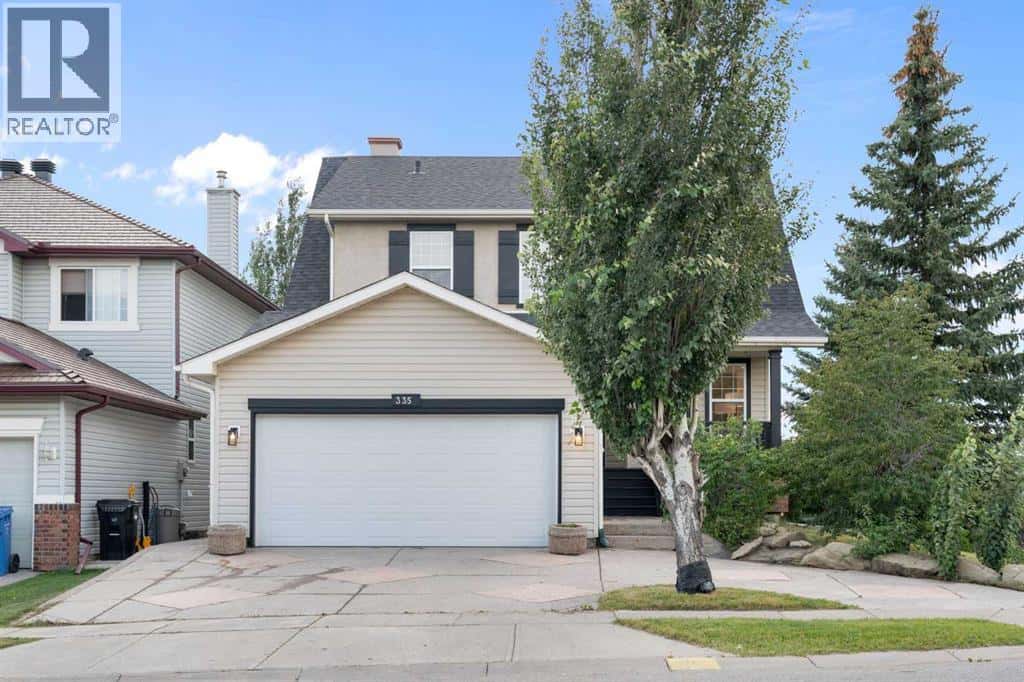 335 Hidden Creek Boulevard NW — Calgary, Alberta - Photo 2 of 50