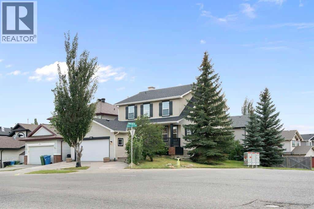 335 Hidden Creek Boulevard NW — Calgary, Alberta - Photo 3 of 50