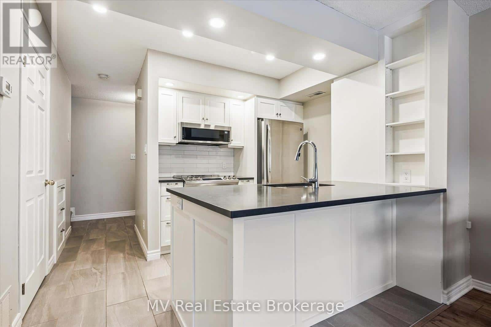 12 - 711 JOHNSTON PARK AVENUE — Collingwood, Ontario - Photo 5 of 30