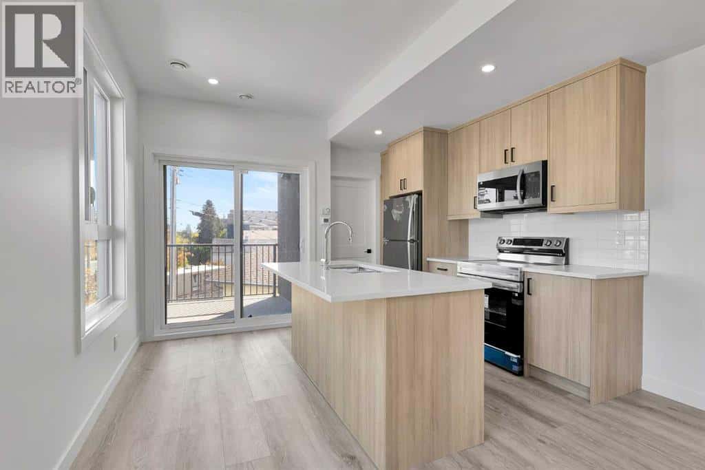 4903 Bowness Road NW — Calgary, Alberta - Photo 4 of 25