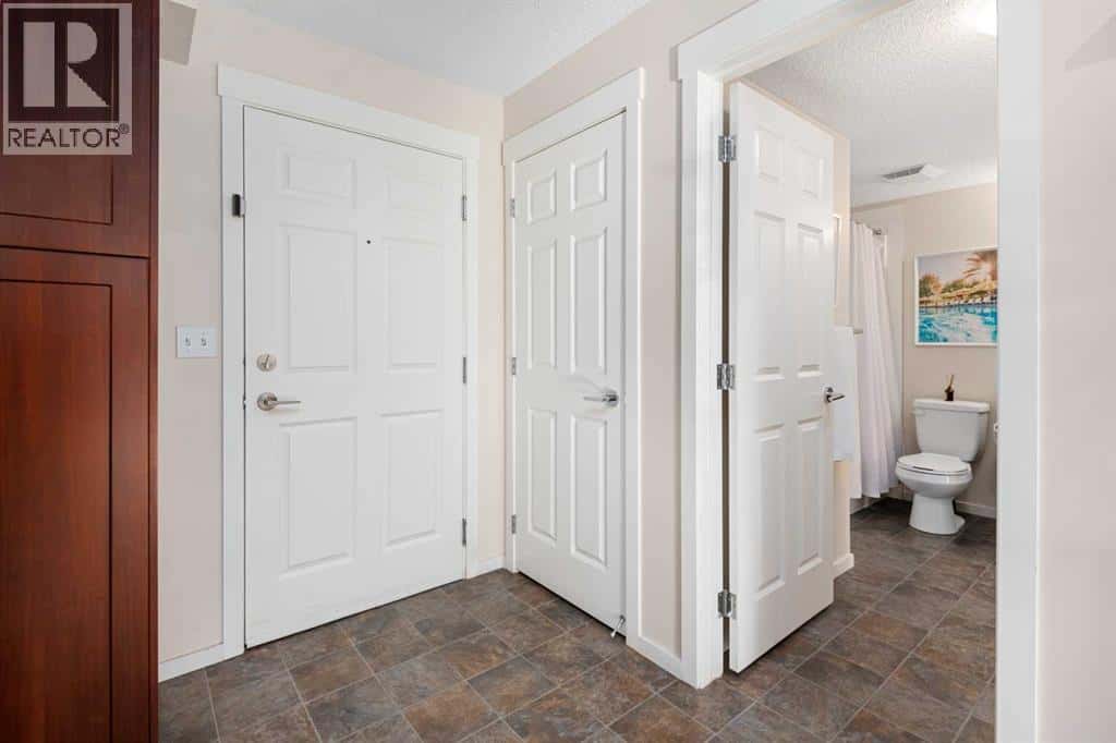 1305, 755 Copperpond Boulevard SE — Calgary, Alberta - Photo 3 of 32