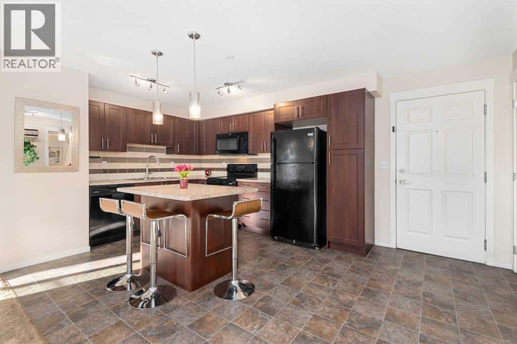 1305, 755 Copperpond Boulevard SE — Calgary, Alberta - Photo 5 of 32