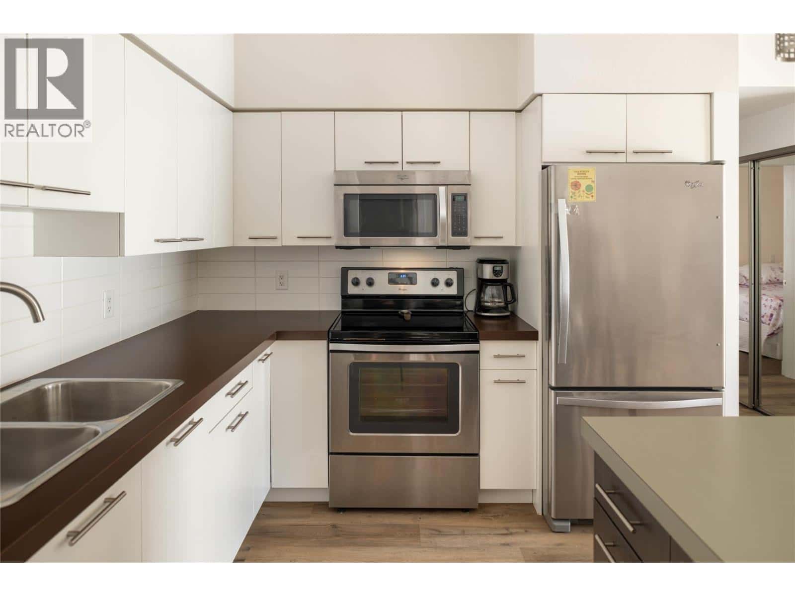 985 ACADEMY Way Unit# 208 — Kelowna, British Columbia - Photo 4 of 22