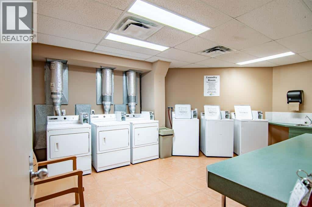 5057, 25054 South Pine Lake Road — Rural Red Deer County, Alberta - Photo 5 of 39