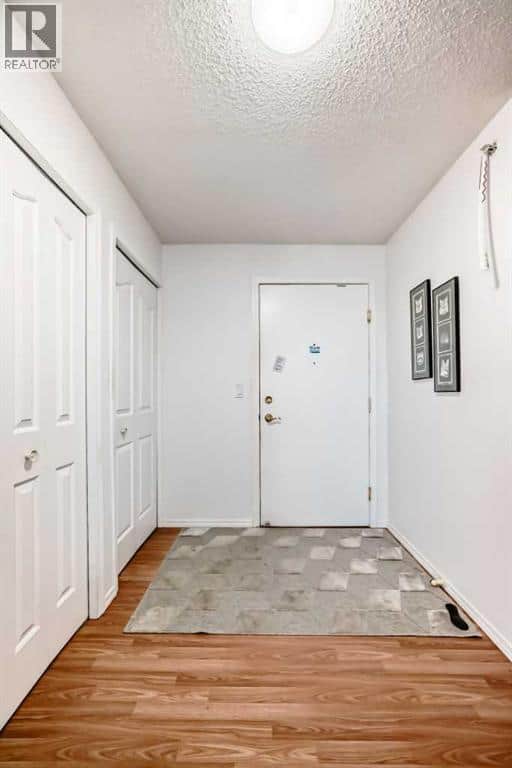 1409, 1000 Millrise Point SW - Photo 4 of 50, Calgary, Alberta